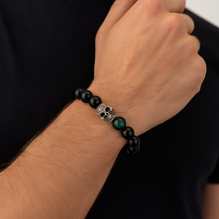 Gold Obsidian and Green Tiger Eye Skull Bracelet with Silver Pave Skull bead on wrist.