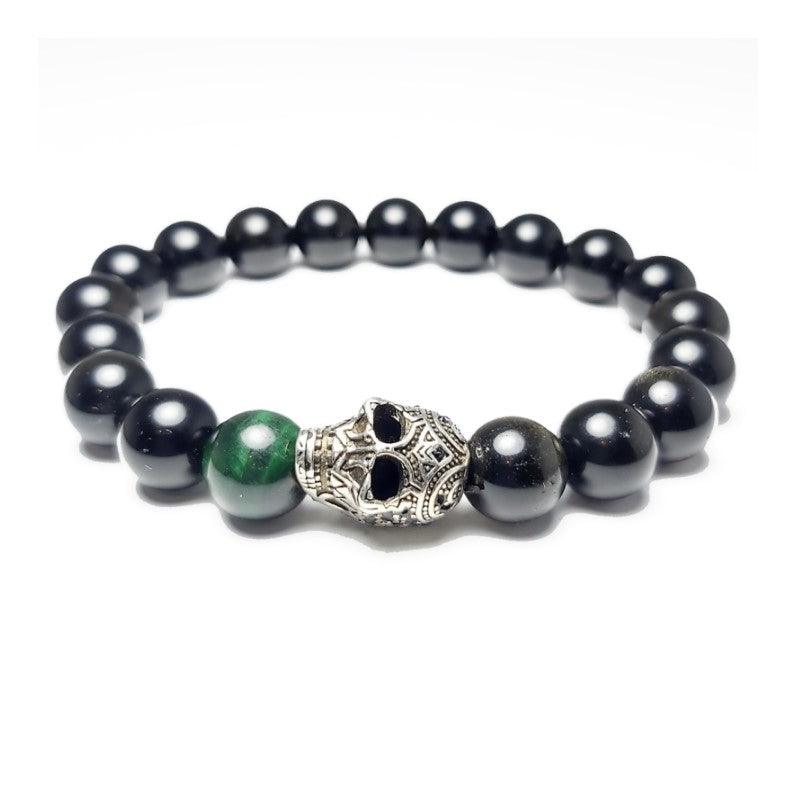 Gold Obsidian and Green Tiger Eye Skull  BraceletObsidian Stone is a powerful cleanser of psychic smog created within your aura, and is a strong psychic protection stone. This stone has powerful metaphysical properBead BraceletsT.M.JTheodore Men's JewelryGold Obsidian and Green Tiger Eye