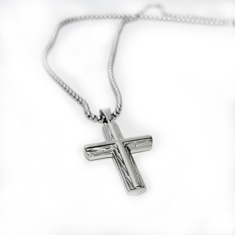 Stainless Steel Cross Pendant with Sculpted Side Design